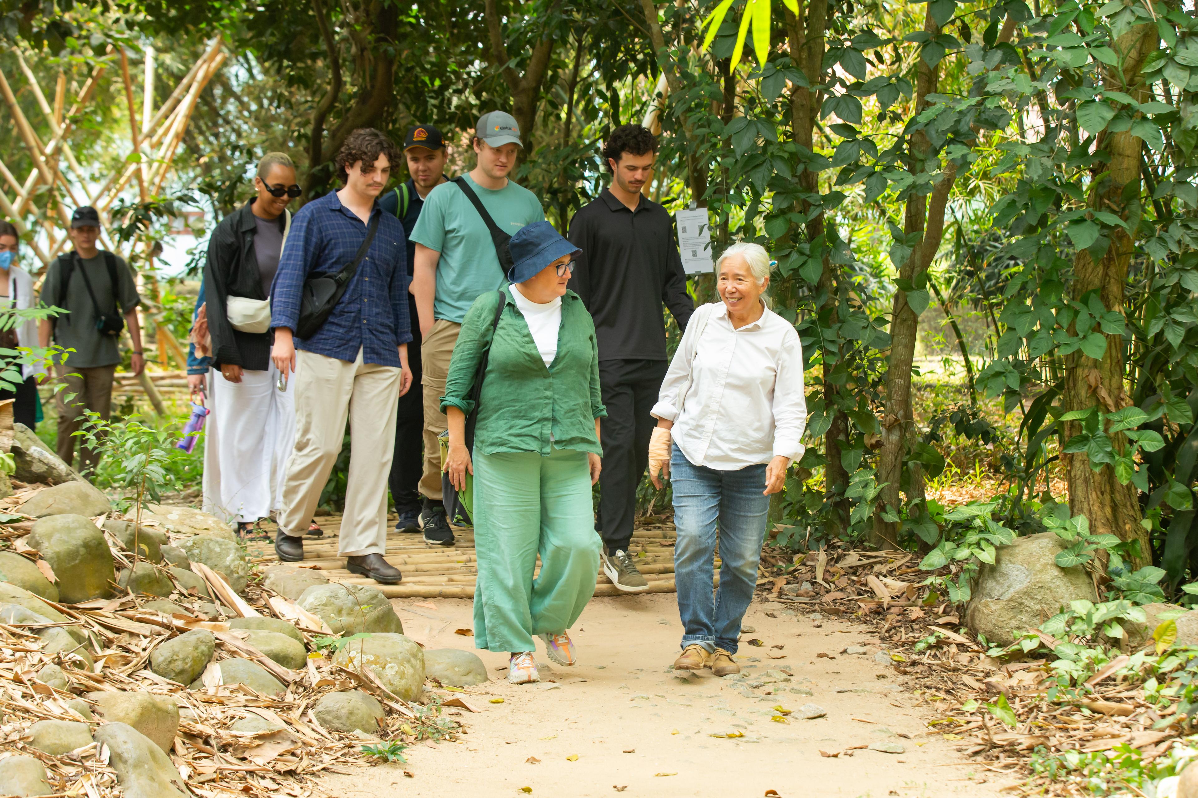 Travellers on a countryside trail in Vietnam