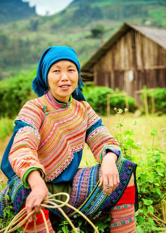 Woman in traditional dress in a mountain village in northern Vietnam